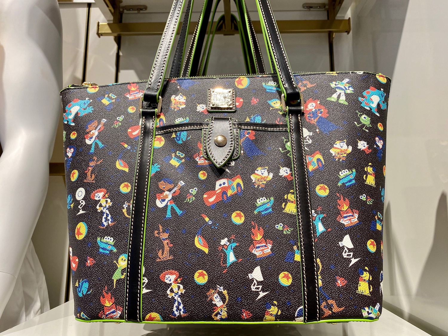 New Disney Dooney and Bourke Collection Celebrates Pixar TouringPlans