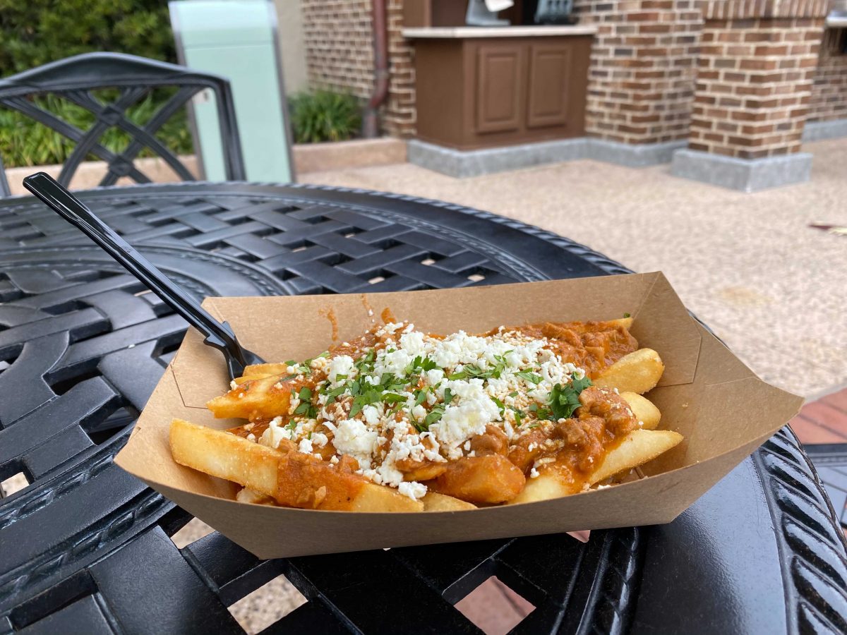 REVIEW Butter Chicken Poutine at The Daily Poutine is Good to the Last Bite Disney by Mark