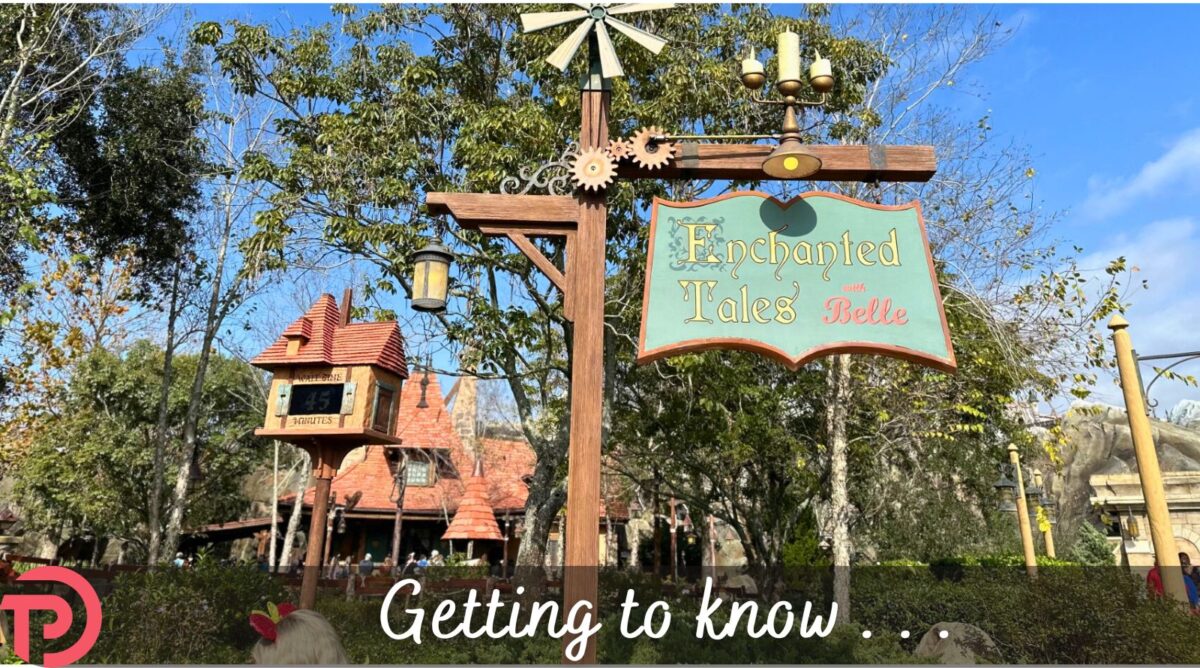 Getting to Know Enchanted Tales with Belle Cover image showing the attraction sign and Belle's cottage in the background.