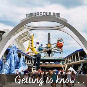 Getting to Know Tomorrowland cover image showing Astro Orbitor framed in the Tomorrowland Entrance Arch